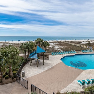 Take in the vibrant beach vibe from your balcony, enjoying the refreshing coastal views and sounds of relaxation