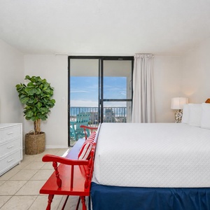 Relax in the queen master suite while watching your favorite shows, with beach views inviting tranquility