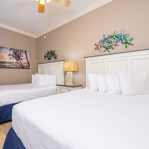 Delight in restful nights in this queen guest suite, surrounded by beach decor that enhances the relaxing vibe