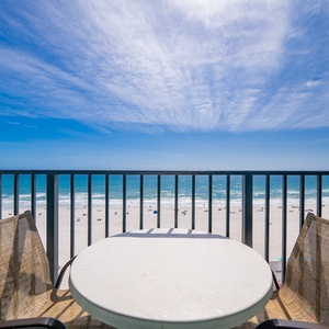 Morning sky stretches wide above your balcony as you savor the gentle rhythm of coastal sounds
