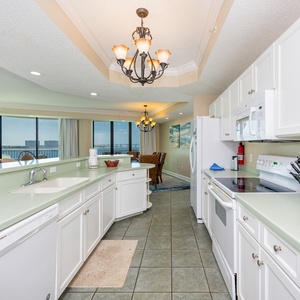 Prepare meals in this stylish kitchen with sleek cabinetry and spacious countertops