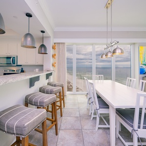 Wake up with morning coffee at the breakfast bar and get ready for a beach day in this stylish space