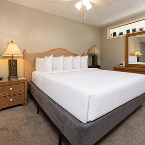Plush king master suite invites restful sleep after a fun day on the beach