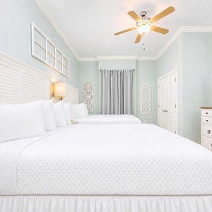 Unwind in this queen guest suite and stream your favorite shows or enjoy a good movie after a beach day