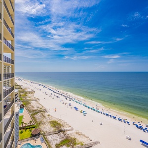 Bask in the warm sun from your balcony, enjoying tranquil coastal views and the soothing sounds of the beach