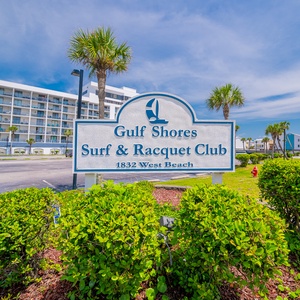 Welcome to Gulf Shores Surf & Racquet Club, where palm trees sway and beach access awaits just steps from your door