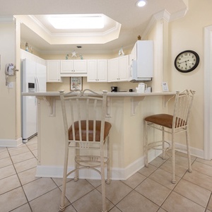 Enjoy drinks and laughter while soaking in the coastal vibes around you at the breakfast bar