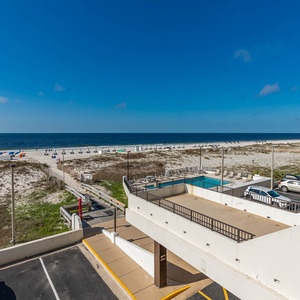 Enjoy stunning beachfront views from this inviting balcony, perfect for relaxation and soaking in the coastal atmosphere