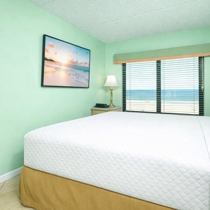 Experience restful nights in the king master suite, where the beach views enhance your relaxation