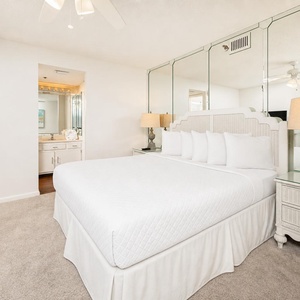 Relax in the king master suite and unwind as you enjoy views of the through the window in your serene escape
