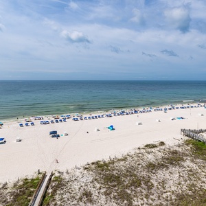 Discover breathtaking views from your beachfront balcony