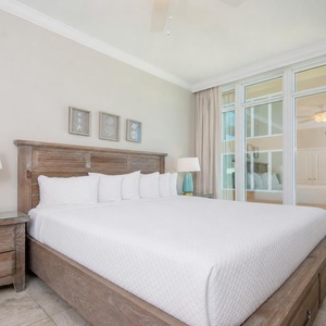 Settle onto the king bed, switch on a bedside lamp, and admire stunning beach views