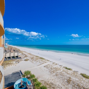 Enjoy breathtaking views from the balcony, where you can relax and soak in the beauty of the shoreline and vibrant skies