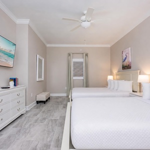Spend peaceful nights in this guest room and stream your favorite shows after a beach day