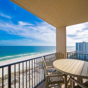 Cool coastal breeze greets you on your balcony as you sit and watch waves roll gently onto the shore