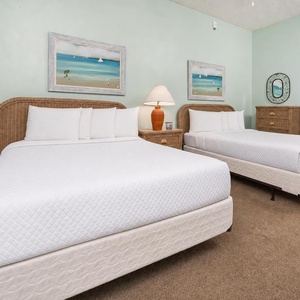 Rest in the plush double beds, surrounded by cheerful decor, while planning your beach adventures together