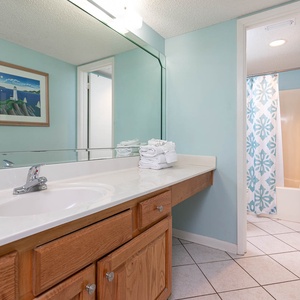 Brighten your morning routine in the master bath with ample counter space and fresh towels ready for you