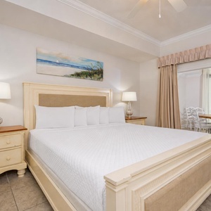 Drift into a peaceful sleep on the soft, inviting king bed in the master suite, surrounded by serene coastal decor