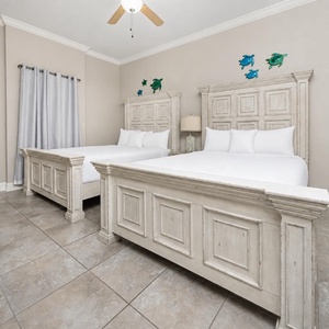 Find comfort in the inviting guest room, where soft queen beds await after a day enjoying beachside adventures