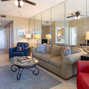 Relax in this inviting living area featuring a sofa with queen sleeper and twin sleeping chair