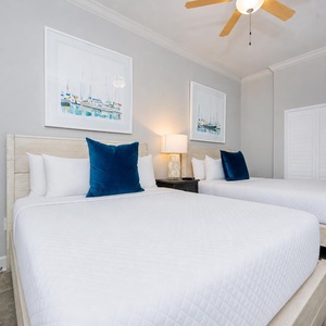 Rest in this queen guest suite, surrounded by coastal decor, inviting restful nights and peaceful mornings