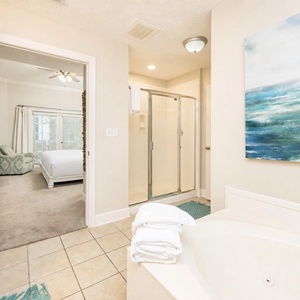 8Refresh in the master bath after a day at the beach with a soothing jetted tub and relaxing walk-in shower