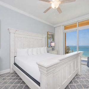 Awaken to sunny coastal views from your king master suite, inviting relaxation in your beach retreat