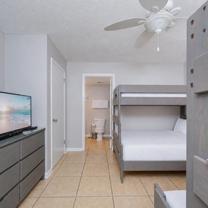 Snuggle up in cozy bunks, with two twins over double beds, perfect for laughter and late-night movies
