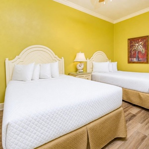 Two double guest suite beds invite restful sleep after your day exploring the coast nearby