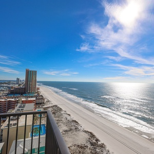 Experience breathtaking views of the shimmering water and shoreline from your east corner balcony