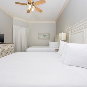 Unwind in this queen guest suite and stream your favorite shows or enjoy a good movie after a beach day