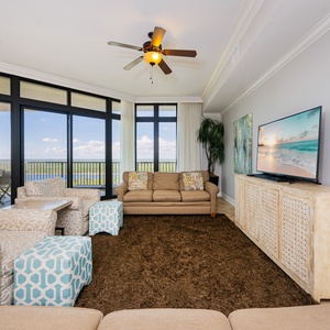 Relax in the inviting living area, streaming your favorite shows while soaking up the vibrant beach vibe