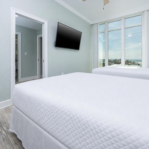Unwind in this queen guest suite and stream your favorite shows or enjoy a good movie after a beach day