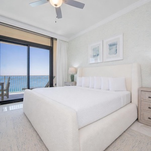 Relax in this master suite featuring a plush king bed, stylish decor, and stunning beachfront balcony views