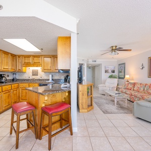 Create memorable family meals with ease in your inviting kitchen, featuring warm wood cabinetry