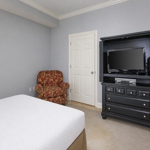 Catch up on your favorite shows while enjoying the serene atmosphere of this queen guest suite