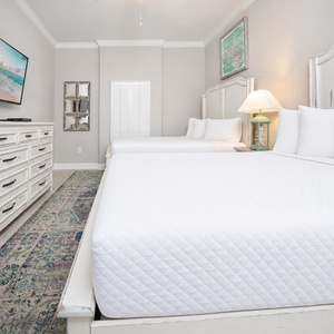 Experience restful nights in one of the queen beds in this guest suite while streaming your favorite shows after a fun day