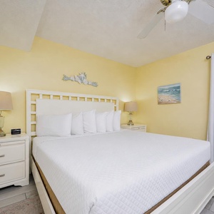 Plush king bed invites you to rest deeply after a day of coastal adventures