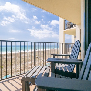 Relax on your balcony, soaking in the coastal views and the soothing sounds of the surf just steps away