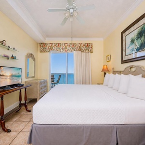 Quiet comfort fills the master suite with a king bed as gentle waves sound beyond your balcony doors