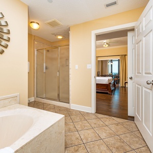 Refresh under warm water in the walk-in shower in the master bath after a day exploring the coast nearby