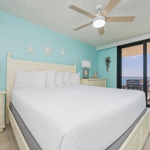 Your master suite with a king bed invites you to watch the sunset from the balcony