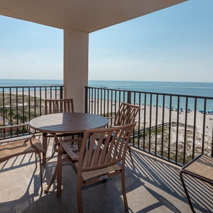 Enjoy meals or drinks while taking in the beautiful beachfront view from your balcony