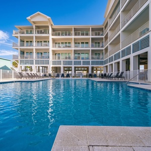 Take a refreshing dip in the pool at Sea Glass, just steps from your beach front getaway for the perfect vacation experience