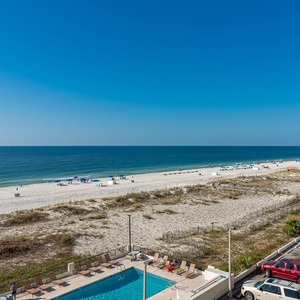 Enjoy breathtaking beachfront views from this inviting space, perfect for relaxation and unwinding by the water