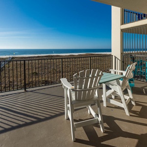 The extra-large balcony is perfect for enjoying a serene view of the beach and tranquil gulf waters