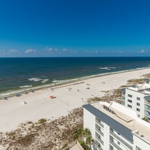 Take in the gulf from the high-rise balcony view and hear waves roll along the shoreline