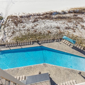 Take a refreshing dip in the inviting gradual entry pool surrounded by lounge chairs and easy access to the beach