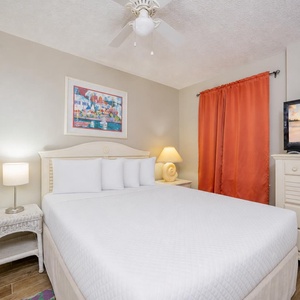 Nighttime calm settles in the guest suite with a queen bed and soft lighting for restful sleep