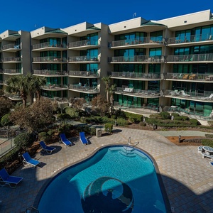 Bask in the sun around the inviting pool, enjoying refreshing dips and laughter in the vibrant surroundings